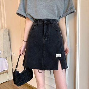 Rokken zwarte spleet denim rok dames 2023 zomer hoge taille slanke a-line tas heup short jeans voor dameskirts