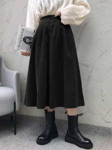 Rokken celmia dames corduroy midi rok 2023 mode streetwear a-line elastische hoge taille jupes femme Koreaanse stijl casual solide
