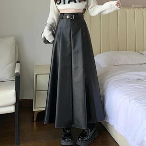 Jupes Classic Black Faux Pu Leather Long avec ceinturé 2024 Haute taille parapluie féminin d'automne féminin hiver