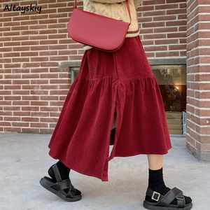 Jupes velours côtelé femmes automne rétro asymétrique plissé fente latérale solide tout-match classique grande taille femmes Streetwear doux