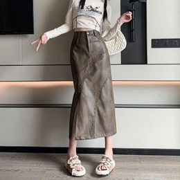 Jupes dayifun rétro mi-longueur pu femmes enveloppe à coupe divisée jupe hanpe haute taille rivet conception de rivet en cuir vêtements