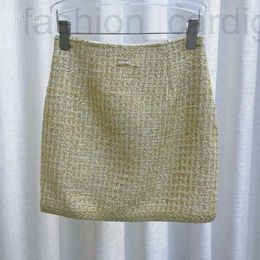 Skirts Designer 2024 Spring Elegant Beauty Little Fragrant Wind Tweed Soft Tweed Gold Hide Half Longitud corta Falda 0ux0