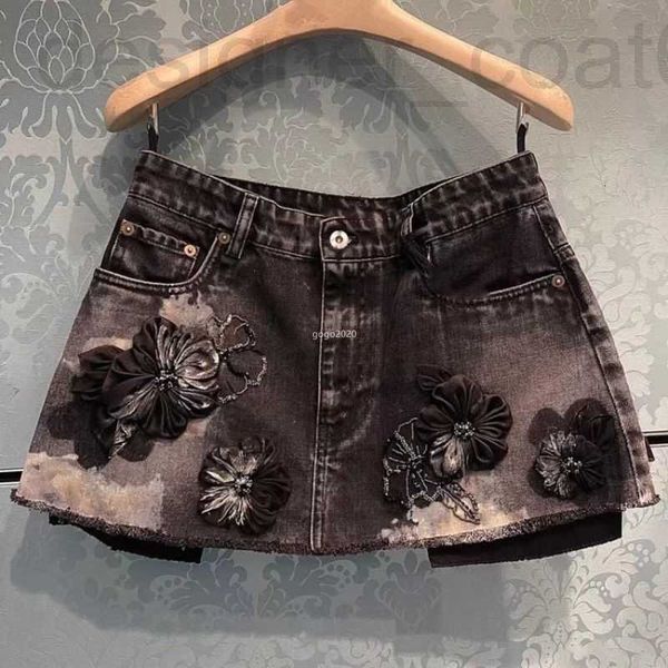 Diseñador de faldas 23 Diseñador de verano para mujer Minifalda de mezclilla de una línea con patrón de letras Niñas Mujer Vintage Milan Runway Marca de gama alta Rebordear personalizado Caliente