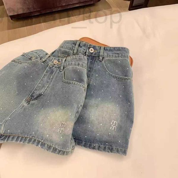 Skirts Designer 24SS New Miu Hot Diamond Washed Denim Jupe avec une doublure antidérapante, confortable à porter, article sucré et polyvalent 5nfw