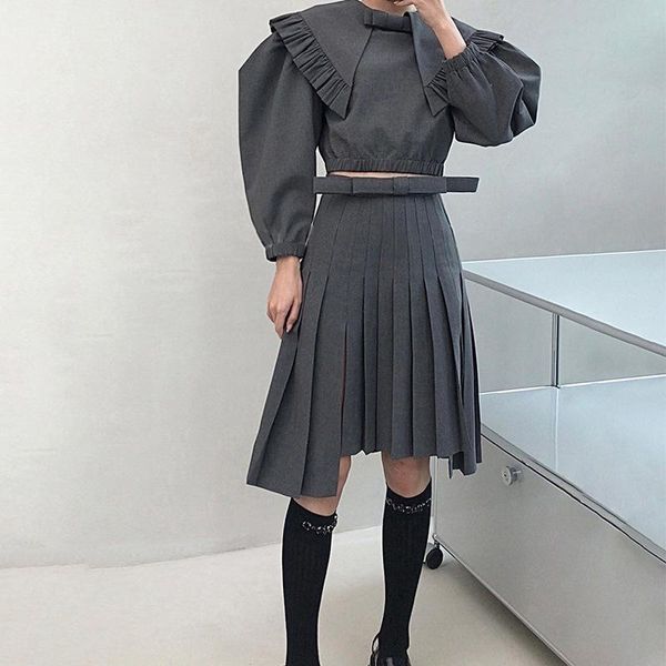 Faldas Diseñador Lindo Arco Falda plisada Split Irregular Estilo universitario Lolita Negro Cintura alta A-Line Tide Vestido Ropa