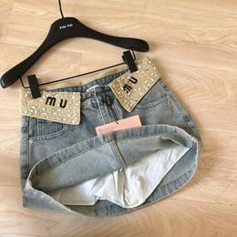 Jupes Designer denim jupe nouvelle américaine style doux mest Mumu logo taille diamant chaud street street street wuste hauteur taim denim jupes courtes pour femmes