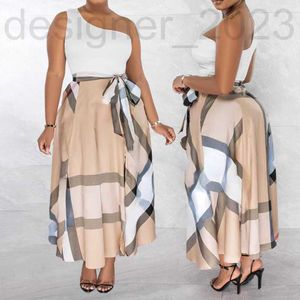 Jupes Designer Jupe courte designer ikini robes décontractées pour femmes avec grand ourlet imprimé à carreaux top femme DFRN