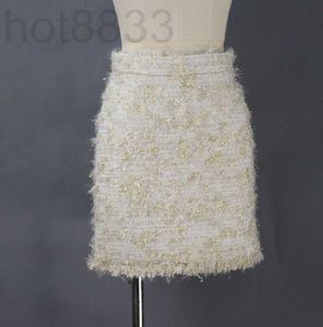 Jupes Designer Printemps Nouvelles femmes Slim Fit Wrap Hip A-ligne courte robe à côtes en fil d'or KS76