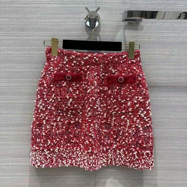 Faldas Moda All-matched Red Snowflake Terciopelo Falda de lana de punto Mujeres Bolsillos dobles Elástico Cintura alta Mini