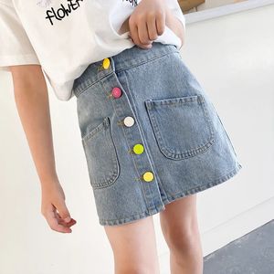 Rokken voor meisjes zomer kinderen mode jean rokken gekleurde knop kinderen school bodembodem baby kinderen kleren denim babyrokken 240419