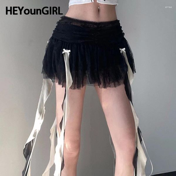 Jupes Heyoungirl Femmes Rouffes esthétiques Jupe en dentelle HEM avec une mode coréenne Chic Low Black Mini Kawaii Girly Clothes