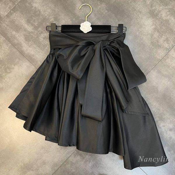 Jupes Jupe irrégulière femmes 2022 printemps taille grand noeud papillon plissé gonflé Jupe Femme mode Streetwear dames vêtements noir Mini