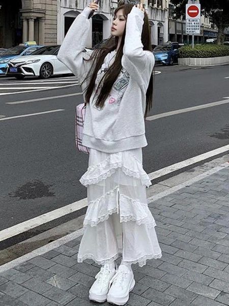 Jupes Irrégularité Design Edge à volant Longue Longue taille mince pour la femme haute dentelle épissant les faldas de la mode coréenne