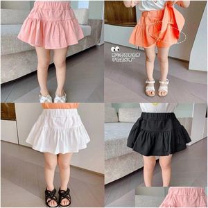 Rokken kinderen meisjes kleren school bodem prinses geplooDed casual solide tutu mini short rok zomer kind 1 13y 230524 drop delive dhzl4