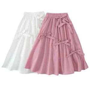 Jupes Lawadka Kipes pour les filles Four Seasons Childrens Clothing Fashion Girl plissé des arcs plissés de vêtements blancs roses 3-12 ans y240522