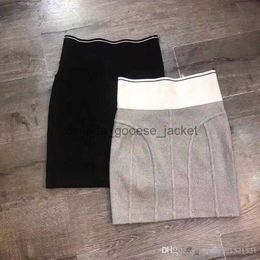 Jupes Nouveau design de mode femmes lettre impression côté fermeture éclair patchwork moulante tunique bandage fil tricoté jupe crayon courte SMLL230908