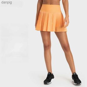 Jupes Nouveaux sports extérieurs plissés plissés élégants jupe de tennis haute taille abdomen poches latérales