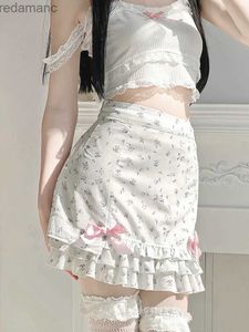 Jupes Jupes-shorts imprimé fleuri à volants mini jupe blanc Kawaii Lolita jupes Style japonais tenue esthétique jupes droites à nœud Y2K Faldas 240330