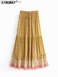Jupes Skorts Vintage Chic mode Hippie femmes plage bohème jaune imprimé fleuri jupe haute taille élastique a-ligne Boho Maxi Femme yq240328
