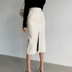 Faldas delgadas rectas de cuero de imitación para Mujer paquete de primavera cadera larga PU Jupe Chic diseño dividido moda sólida Mujer Faldas 220924