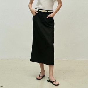 Jupes printemps et été Style décontracté poche incurvée décoration fente arrière taille haute a-ligne jupe en jean pour les femmes