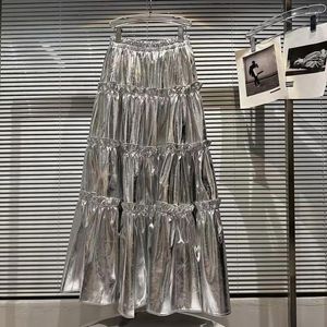 Jupes printemps automne fée argent volants en cuir Pu Midi jupe à plusieurs niveaux femmes taille haute longue luxe vêtements de créateur 2024