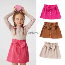 Faldas Spring Ldren Baby Girl Skirts 0-4y lindo arco dulce botón A-línea Faldas Autumn Girls Ropa de moda sólida H240429