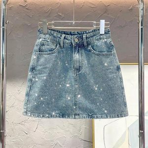 Jupes d'été mode haute taille diamants vintage diamants a-ligne mini jupe denim féminin. Vêtements féminins décontractés