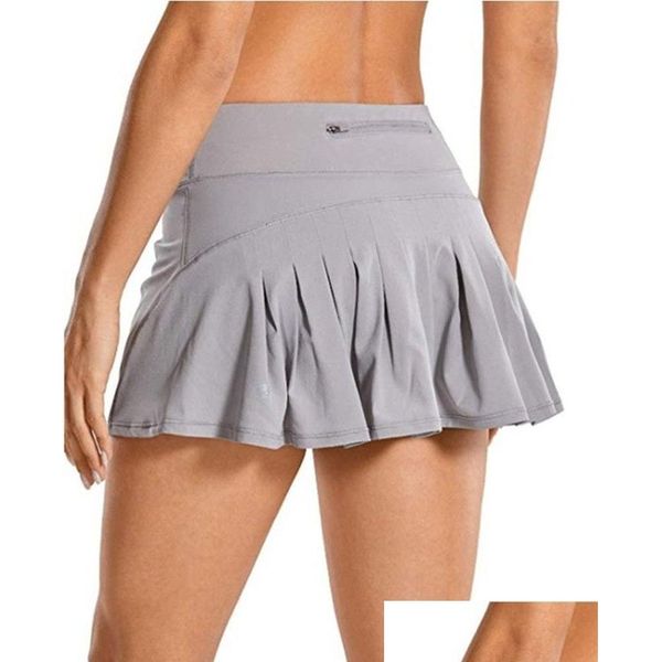 Jupes Femme Tennis Pleat Yoga Jupe Gym Vêtements Femmes Athlétique Running Sport L07 Fitness Golf Shorts Mini Workout Ruffly Solid Ela Dhfal