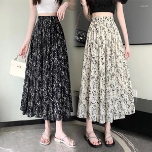 Faldas para mujeres Falda larga primavera 2024 Oficina de la oficina Corea estilo sólido tejido floral pliegues de cintura alta