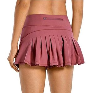 Jupes Femmes Sport Tennis jupes couleur unie Fiess Shorts taille haute athlétique course courte plissée Sport Skort poche Mini jupe