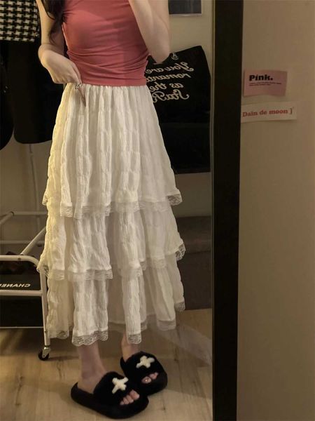 Joupes Femmes 2024 Fashion Coréenne Femmes Nouveaux blancs noir blanc Crochet en dentelle Summer High Elastic Asse Low Ruffle Pleed Pleed Jirts
