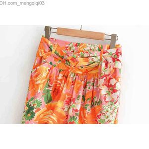 Rokken wowmen sjerpen bloemen mini rokken mode dames geplooide knop abone lnee rok elegante vrouwelijke prairie chique stijl Z230705