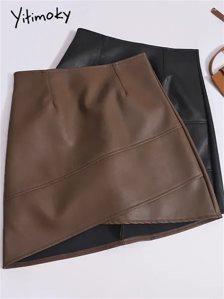 Jupes Jupe en cuir yitimoky pour les femmes 2024 mode vintage haute éclairage à la taille une ligne décontractée asymétrique noire mini