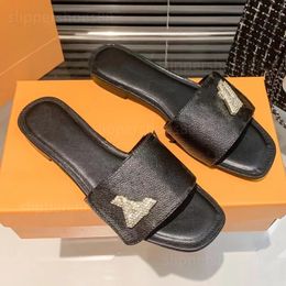 slides designer vrouwen sandalen beroemde sliders lock it shake platte mule sandles slipper slider zomer mode strand flats schoenen lederen print borduren flipflops