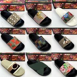 Diapositives femmes manche de luxe sandales sandales sandales réels en caoutchouc tôles à flop appartements florales glissades de fleur d'été