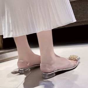 Slip op rubber vrouwelijke sandalen flats mode kristallen schoenen vrouwen zomer puntige teen pvc platte schoenen voor vrouwen Romeinse strandschoenen Dshgretw