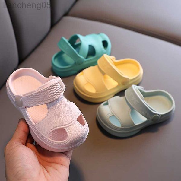 Zapatilla Zapatos de bebé Verano Bebé Agujero Zapatos Antideslizantes Piso suave Sandalias para niños pequeños Niños Niña Niños Casual Color caramelo Zapatillas de playa romanas W0217