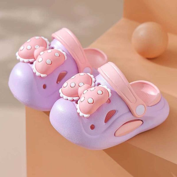 Pantoufle Nouveau été de 0 à 5 ans, glissière pour enfants mignons sandales pour enfants archers adaptés à la boîte à orteil des filles flip non glissade familiale Chaussures de jardin pour enfants y240518