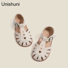 Pantoufle unishuni filles à moitié sandale enfants chaussures en cuir authentiques enfants creux de la chaussure d'été du printemps