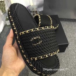 Slippers 2023ss zomer damesslippers designer high-end dezelfde platte sandalen kleur geweven ketting trendy mode qiuti17