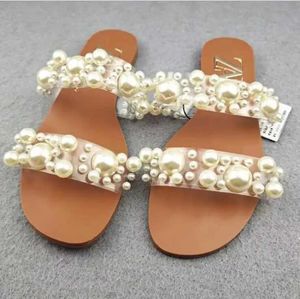 Slippers 2024 Zomer Nieuwe Water Diamant Enkele Vinger Strand Sandalen Outdoor Leisure Volledige Match Womens Leather Home Slide J240402