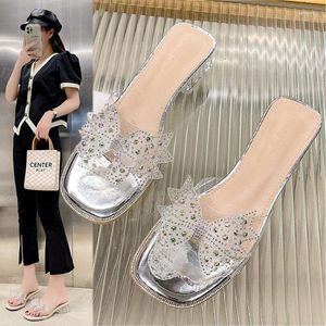 Pantoufles à talons hauts avec nœud papillon en cristal pour femmes, sandales d'été à bout ouvert en Pvc Transparent, à talons clairs, diapositives de mode de fête, 2023