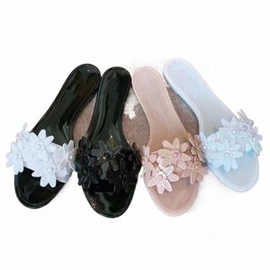 2022 zapatillas diseñador de lujo para mujer zapatos de tacón plano flor negro blanco sandalias de goma playa zapatillas al aire libre