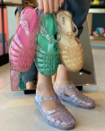 Slippers Melissa Chaussures féminines 2023 Nouvelles sandales féminines Melissa enveloppées de chaussures à gelée creuse plate chaussures de plage romaine sm128