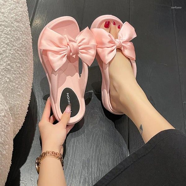 Zapatillas rosa gran bownot chanclas de cuña para mujeres verano 2024 plataforma espesa suela no slip playa tobogán sandalias de Mujer