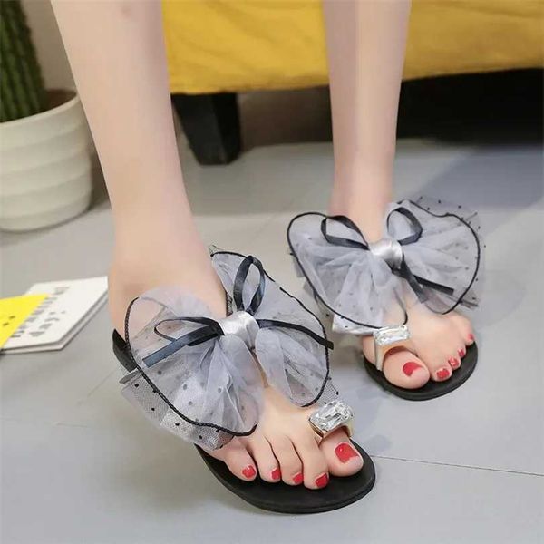 Slippers Slippers Summer Womens Sweet Bow Lace Slider Crystal Rhinestone Girl Flat Sandales Outdoor Beach Shoes Zapatos de Jer H2403267TVD