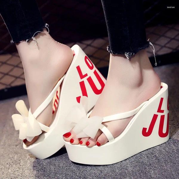 Slippers Summer Arch Taldge tongs tongs Flops Women's Wear Bow Sweet Vacation Sandals Banquet de plage sexy High Talon 11cm Apparaît Chaussures minces