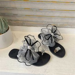 Slippels zomer schattige bowtie decoreren niet-slip sandalen slipper flats muilezels casual mode vrouwelijke slippers mesh strand dia's pantuflas g230328