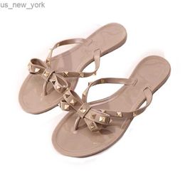 Slippers Zomer Vrouwen Strand Slippers Schoenen Klassieke Kwaliteit Bezaaid Dames Cool Bow Knoop Platte Slipper Vrouwelijke Jelly Sandalen Schoenen l230520